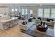 Open concept living area with hardwood floors, kitchen island, and lots of natural light at 904 Delano Dr, Knightdale, NC 27545