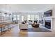 Bright living room featuring a fireplace and hardwood floors at 904 Delano Dr, Knightdale, NC 27545
