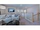Spacious loft area with comfortable seating and a TV at 904 Delano Dr, Knightdale, NC 27545