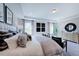 Bright and airy bedroom with a king-size bed and sitting area at 904 Delano Dr, Knightdale, NC 27545