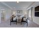 Main bedroom suite with high ceilings, plush carpeting, and ensuite bath at 904 Delano Dr, Knightdale, NC 27545