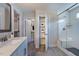 Modern bathroom with double vanity and large walk-in shower at 904 Delano Dr, Knightdale, NC 27545