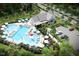 Community pool with lounge chairs and surrounding landscaping at 905 Delano Dr, Knightdale, NC 27545