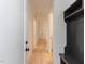 Bright hallway with light wood floors and built-in storage at 103 Brandy Ml, Pittsboro, NC 27312