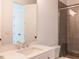 Bathroom with single vanity, quartz countertop and glass shower at 103 Brandy Ml, Pittsboro, NC 27312