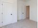 Bright bedroom with carpet and double door closet at 103 Brandy Ml, Pittsboro, NC 27312