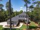 Two-story house with gray siding, dark roof and walkway at 103 Brandy Ml, Pittsboro, NC 27312