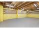 Unfinished basement area with pegboard and ample storage at 719 Allforth Pl, Cary, NC 27519