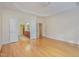 Bright and airy bedroom with hardwood floors and access to bathroom at 719 Allforth Pl, Cary, NC 27519