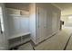 Bright entryway with built-in bench, shelving, and coat closets at 95 Mapledale Ct, Benson, NC 27504