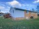 Side view of a ranch style home with brick and siding at 376 Gunn Poole Rd, Mebane, NC 27302