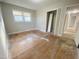 Spacious bedroom with hardwood floors and hallway view at 376 Gunn Poole Rd, Mebane, NC 27302