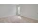 Spacious bedroom with neutral walls and carpeted floor at 2892 Huxley Way, Apex, NC 27502