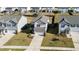 Aerial view of a charming two-story house in a residential neighborhood at 2117 Attend Xing, Fuquay Varina, NC 27526