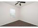 Bright bedroom with hardwood floors and a window with blinds at 2117 Attend Xing, Fuquay Varina, NC 27526