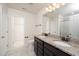 Bathroom with double vanity, granite countertops and a walk-in shower at 2117 Attend Xing, Fuquay Varina, NC 27526