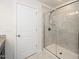 Modern bathroom with a large walk-in shower and a separate linen closet at 2117 Attend Xing, Fuquay Varina, NC 27526
