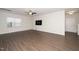 Spacious living area with hardwood floors and neutral walls at 2117 Attend Xing, Fuquay Varina, NC 27526
