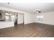 Spacious living room with hardwood floors and a ceiling fan at 2117 Attend Xing, Fuquay Varina, NC 27526