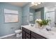 Bathroom with double vanity, large mirror, and shower at 2896 Huxley Way, Apex, NC 27502