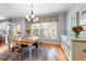 Bright dining room with hardwood floors and lots of natural light at 6462 Grassy Knoll Ln, Raleigh, NC 27616