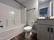 Clean bathroom with tub shower combo and vanity at 132 S Mistflower St, Clayton, NC 27520