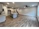 Open kitchen with island and stainless steel appliances at 132 S Mistflower St, Clayton, NC 27520