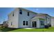 Two-story home with light gray siding and a private patio area at 1071 Cherry Stem Rd, Haw River, NC 27258