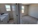 Laundry room with washer, dryer, and extra storage space at 1071 Cherry Stem Rd, Haw River, NC 27258