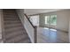 Staircase leading to the second floor of the home at 1071 Cherry Stem Rd, Haw River, NC 27258
