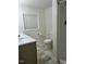 Bathroom features a toilet, double vanity, and shower at 876 Vanco Mill Rd, Henderson, NC 27537