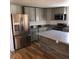 Modern kitchen with stainless steel appliances and island at 876 Vanco Mill Rd, Henderson, NC 27537
