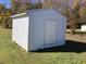 White metal storage shed in backyard at 876 Vanco Mill Rd, Henderson, NC 27537