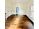 Spacious bedroom with hardwood floors and an en-suite bathroom at 425 Price Ave, Durham, NC 27707