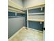 Large walk-in closet with double hanging rods and shelves at 425 Price Ave, Durham, NC 27707