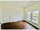 Spacious bedroom with hardwood floors and large windows at 425 Price Ave, Durham, NC 27707