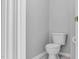 Small powder room with toilet and single sink at 142 Brentfield Loop, Morrisville, NC 27560