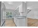 Modern kitchen with granite countertops and stainless steel appliances at 142 Brentfield Loop, Morrisville, NC 27560