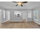 Spacious living room with hardwood floors and kitchen views at 142 Brentfield Loop, Morrisville, NC 27560