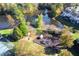 Community playground by a pond at 142 Brentfield Loop, Morrisville, NC 27560