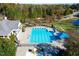 Community lap pool with adjacent clubhouse at 142 Brentfield Loop, Morrisville, NC 27560