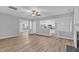 Living room with hardwood floors, fireplace and kitchen views at 142 Brentfield Loop, Morrisville, NC 27560