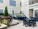 Outdoor patio area with fireplace and seating at 222 Glenwood # 602, Raleigh, NC 27603