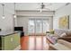 Spacious living room with hardwood floors and access to balcony at 222 Glenwood # 602, Raleigh, NC 27603