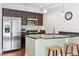 Modern kitchen with stainless steel appliances and granite countertops at 222 Glenwood # 602, Raleigh, NC 27603