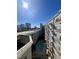 Aerial view of a condo building with a swimming pool and surrounding cityscape at 222 Glenwood # 602, Raleigh, NC 27603
