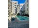 Community pool with surrounding lounge seating at 222 Glenwood # 602, Raleigh, NC 27603