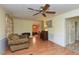 Comfortable living room with hardwood floors and ample natural light at 178 Paceville Rd, Selma, NC 27576