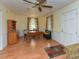 Cozy dining area featuring hardwood floors and built-in bench at 178 Paceville Rd, Selma, NC 27576
