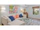 Living room featuring a sectional sofa, coffee table, and large abstract art at 3738 Yorktown Pl, Raleigh, NC 27609